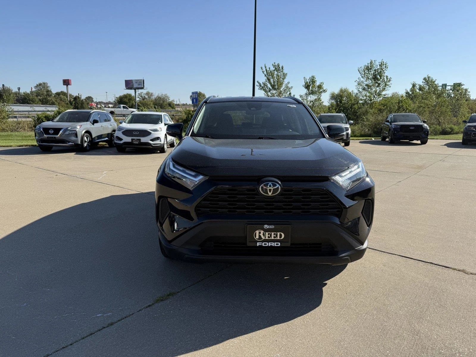 Certified Used 2025 Midnight Black Metallic Toyota XLE image 3