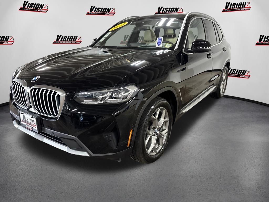Used 2024 Black BMW xDrive30i image 1