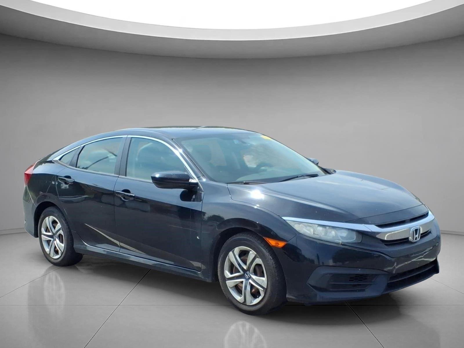 Used 2017 Crystal Black Pearl Honda LX image 1