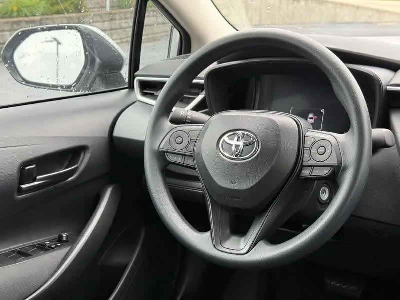 Used 2026 Classic Silver Metallic Toyota LE image 12