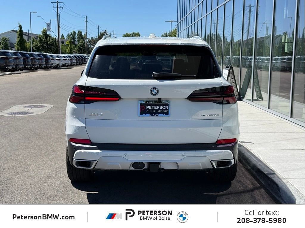 New 2026 Alpine White BMW xDrive50e image 4