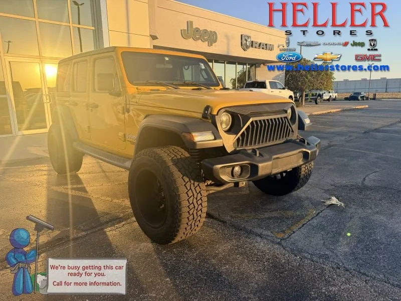 Used 2018 Baja Yellow Clearcoat Jeep Sport image 1