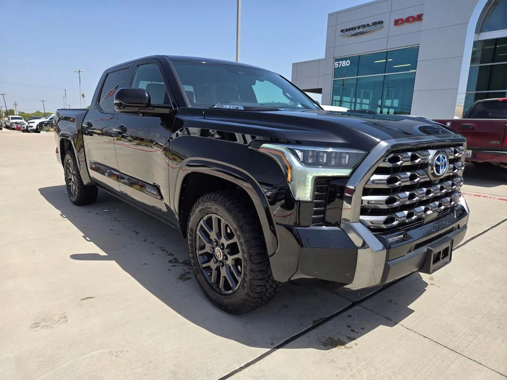 Used 2024 Black Toyota Platinum image 1