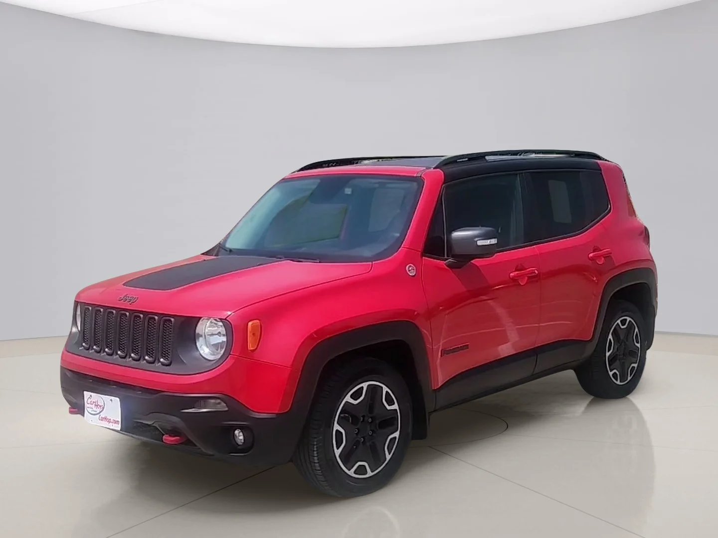 Used 2015 Red Jeep TRAILHAWK image 1