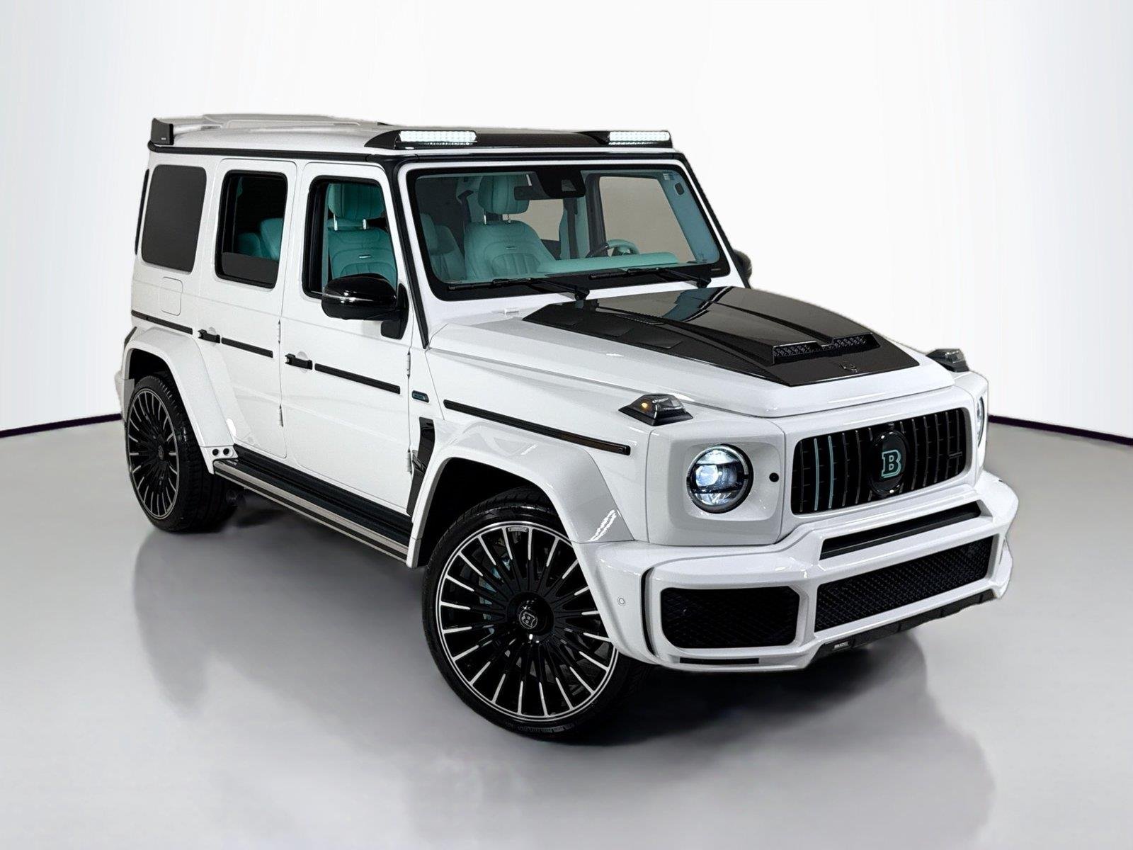 Used 2024 Polar White Mercedes-Benz AMG® G 63  Brabus Custom Widebody / Custom Tiffany Interior image 51
