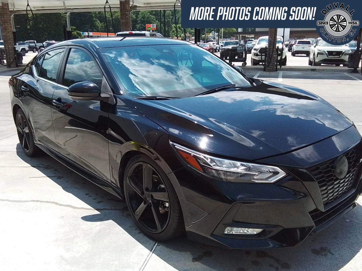 Used 2022 Super Black Nissan SR image 1