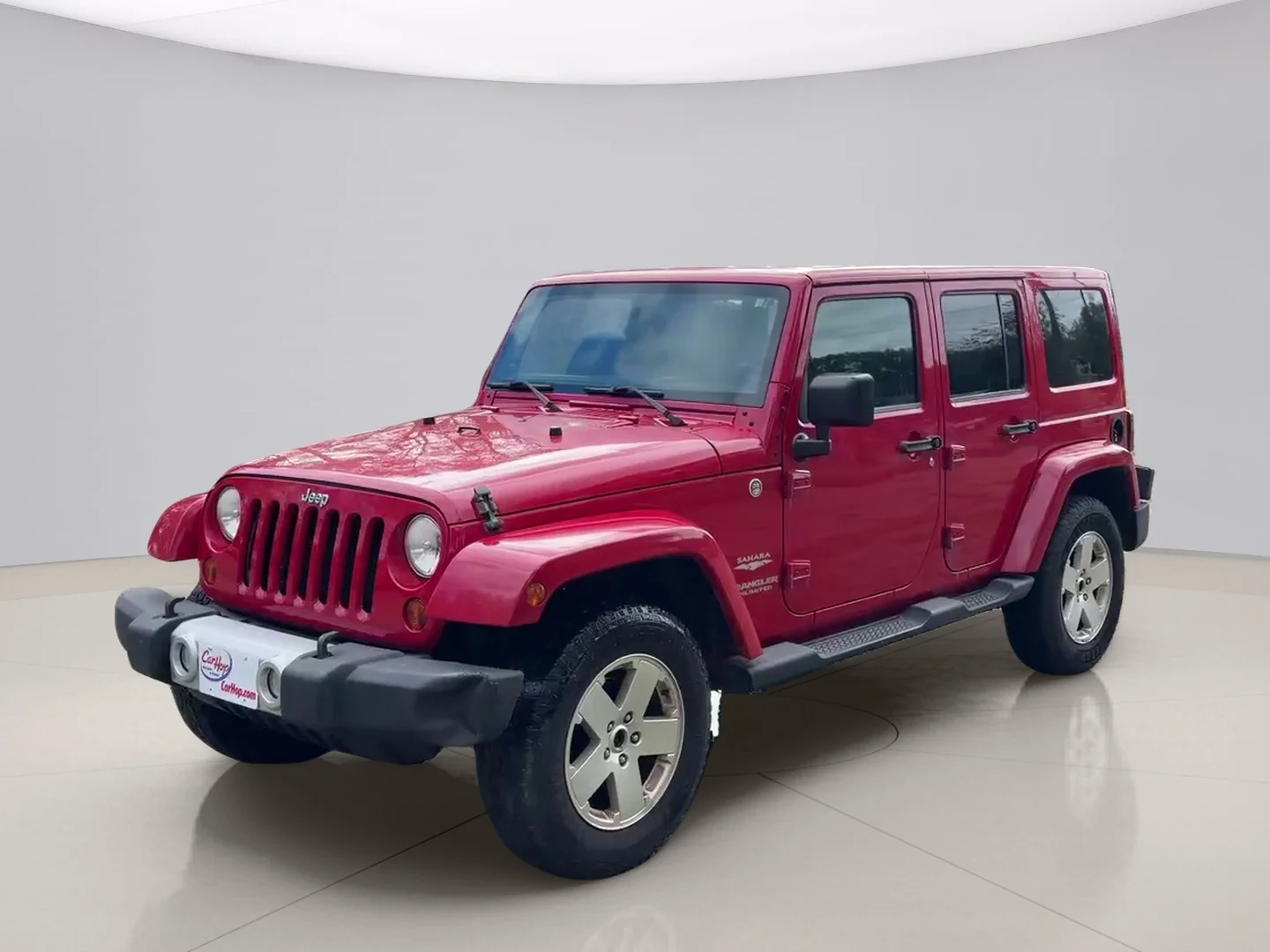 Used 2011 Red Jeep UNLIMITED image 1