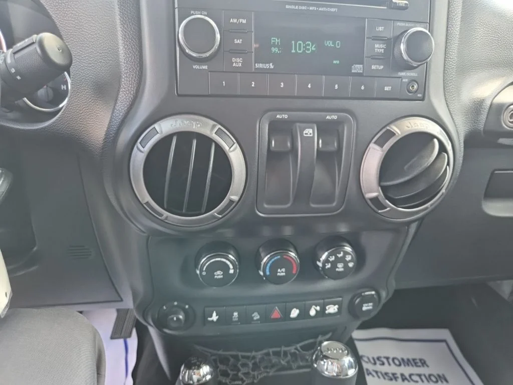 Used 2012 Bright Silver Metallic Jeep Sport image 15