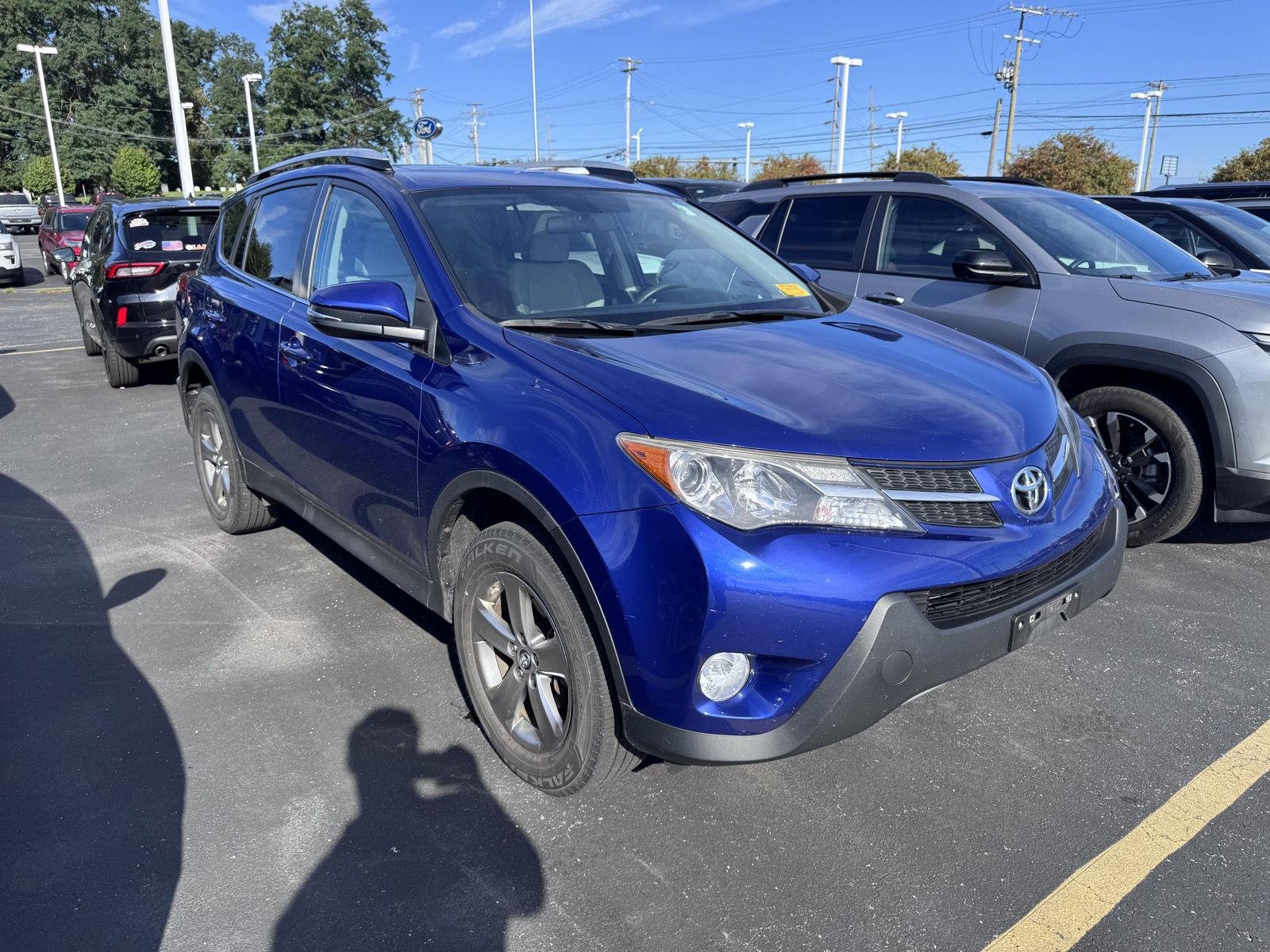 Used 2015 Blue Crush Metallic Toyota XLE image 2