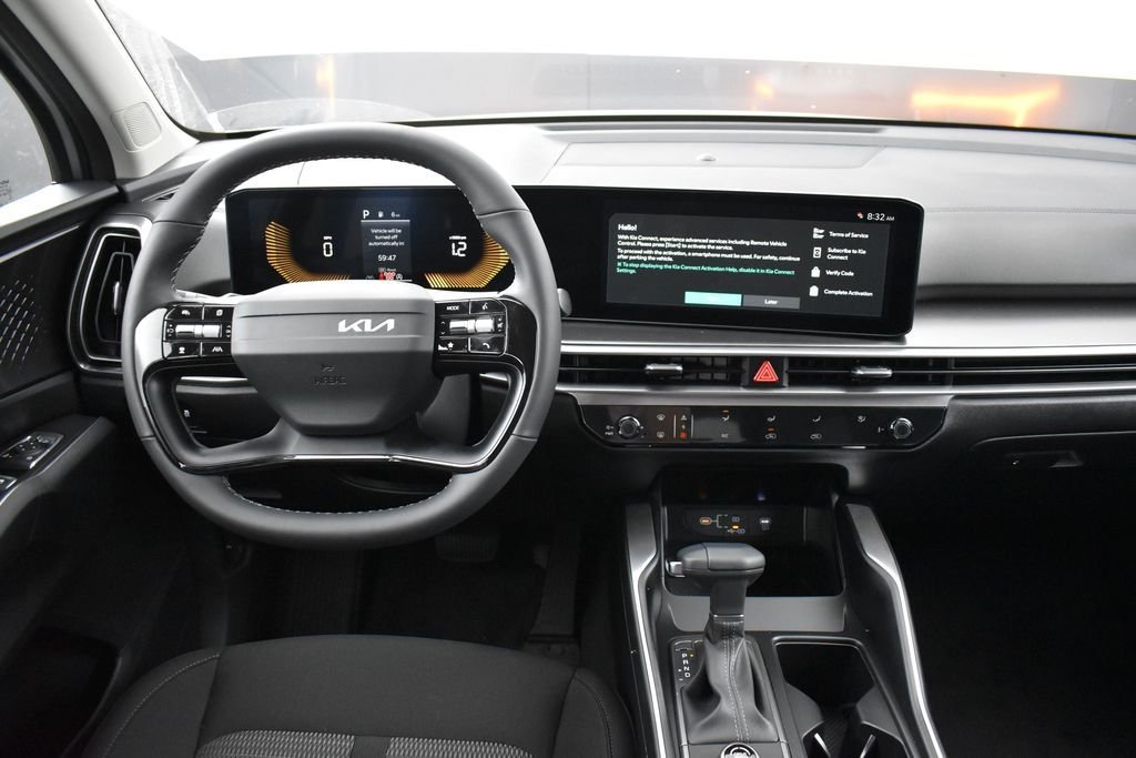 New 2026 Ivory Silver Kia LX image 12
