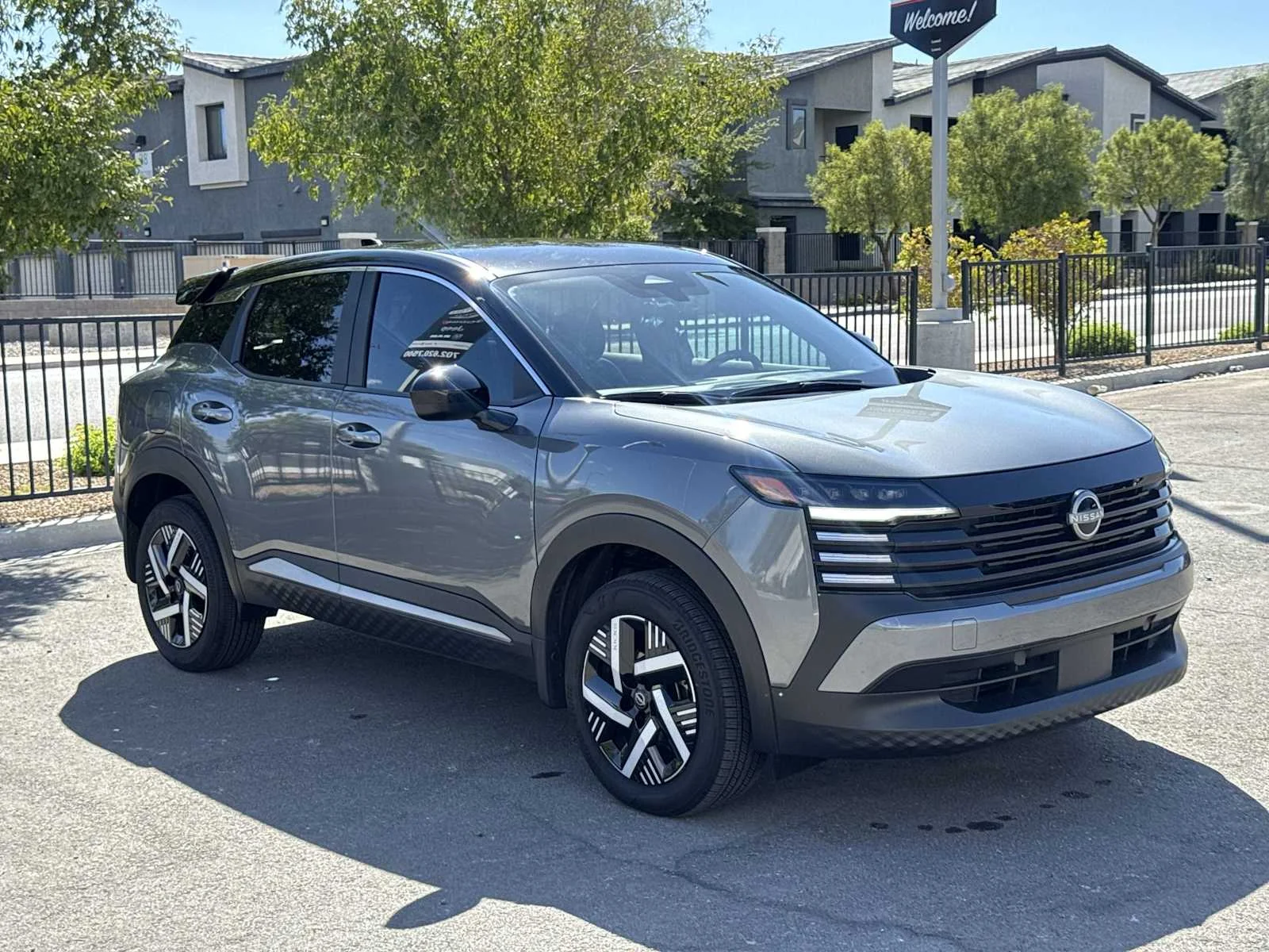 Used 2025 Gun Metallic/Super Black Nissan SV image 2