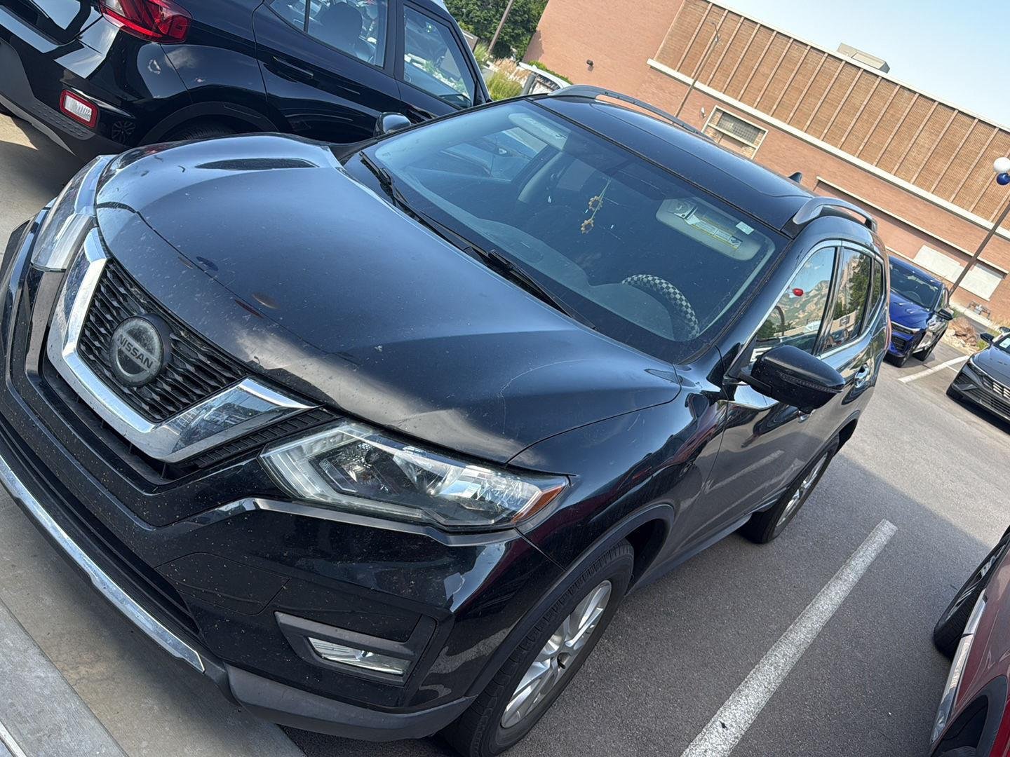 Used 2018 Magnetic Black Nissan SV image 2