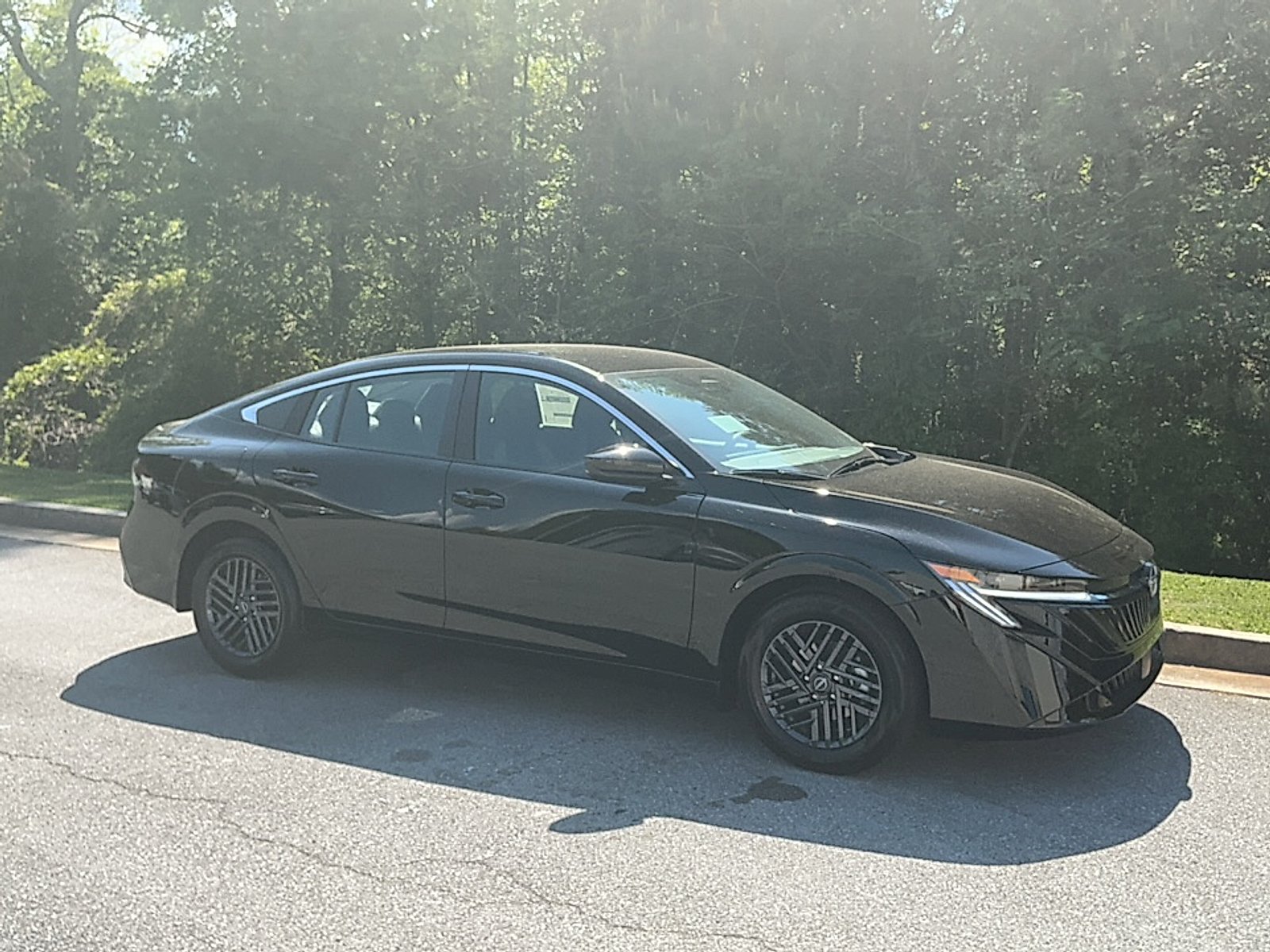 New 2026 Super Black Nissan SV image 1