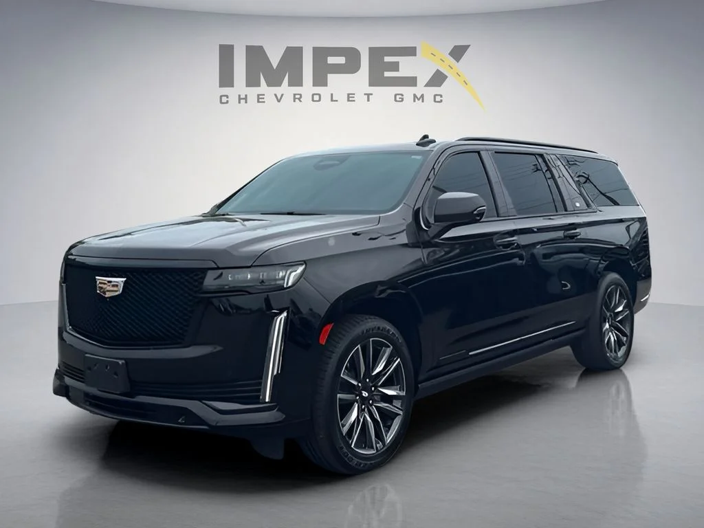 Used 2023 Black Cadillac Sport image 1