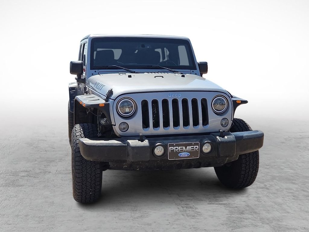Used 2016 Billet Silver Metallic Clearcoat Jeep Unlimited Sport image 2