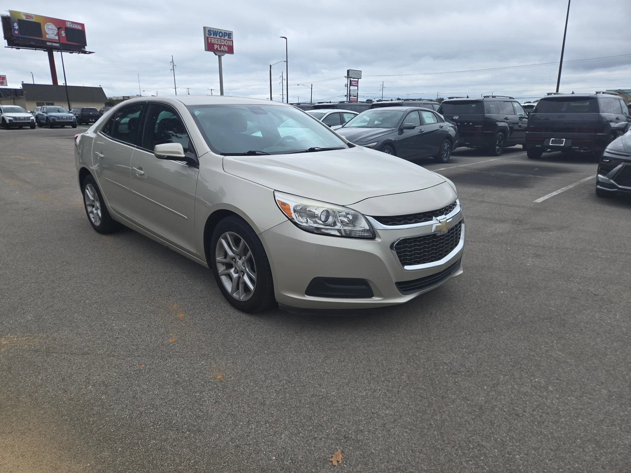 Used 2016 Champagne Silver Metallic Chevrolet LT image 1