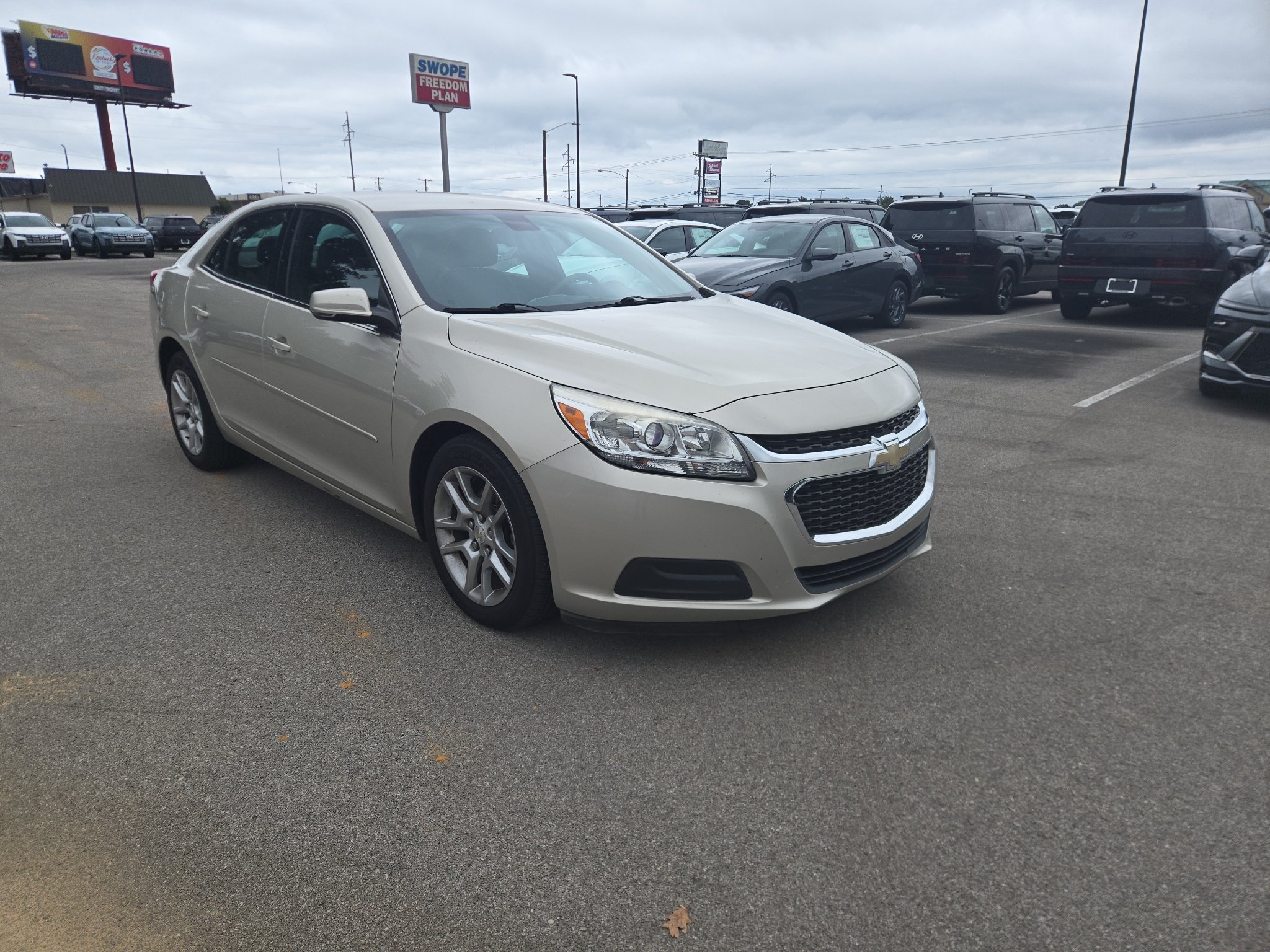 Used 2016 Champagne Silver Metallic Chevrolet LT image 1