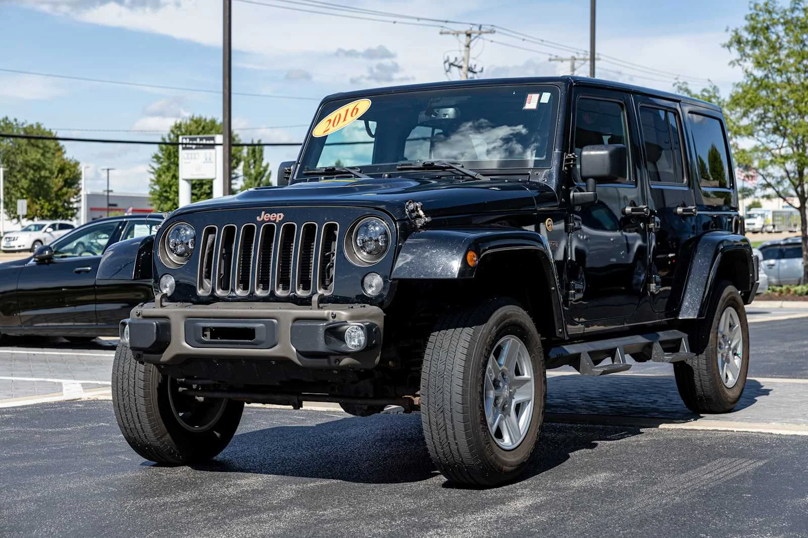Used 2016 Black Clearcoat Jeep 75th Anniversary image 3