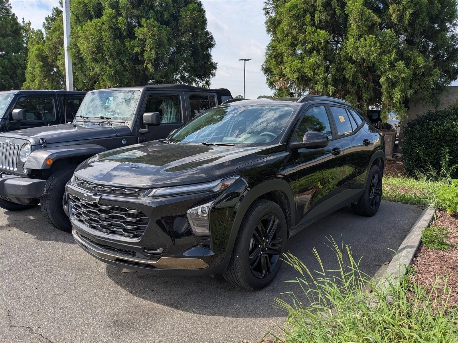 Used 2025 Mosaic Black Metallic Chevrolet ACTIV image 1