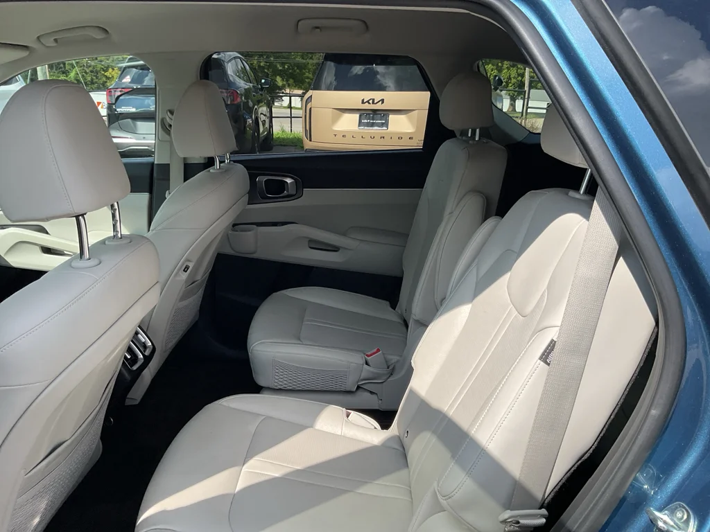 Used 2025 Mineral Blue Kia EX image 12