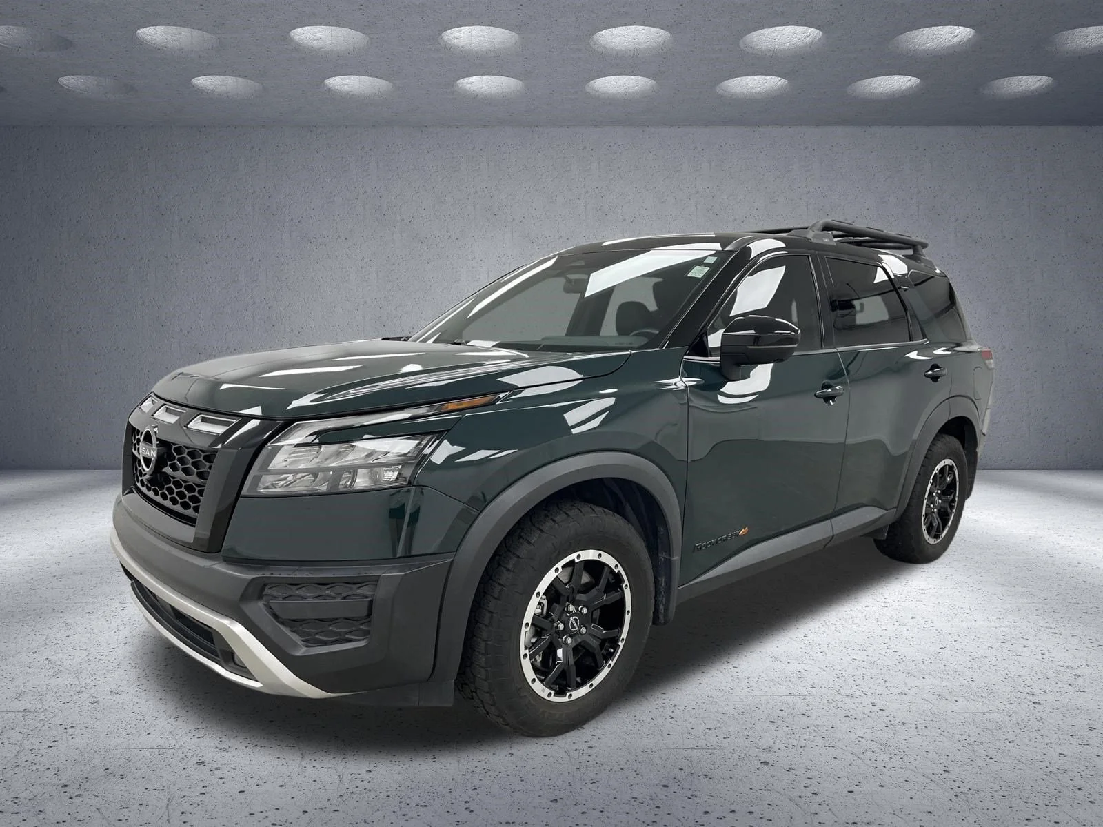 Used 2023 Obsidian Green Pearl/Super Black Nissan Rock Creek image 1