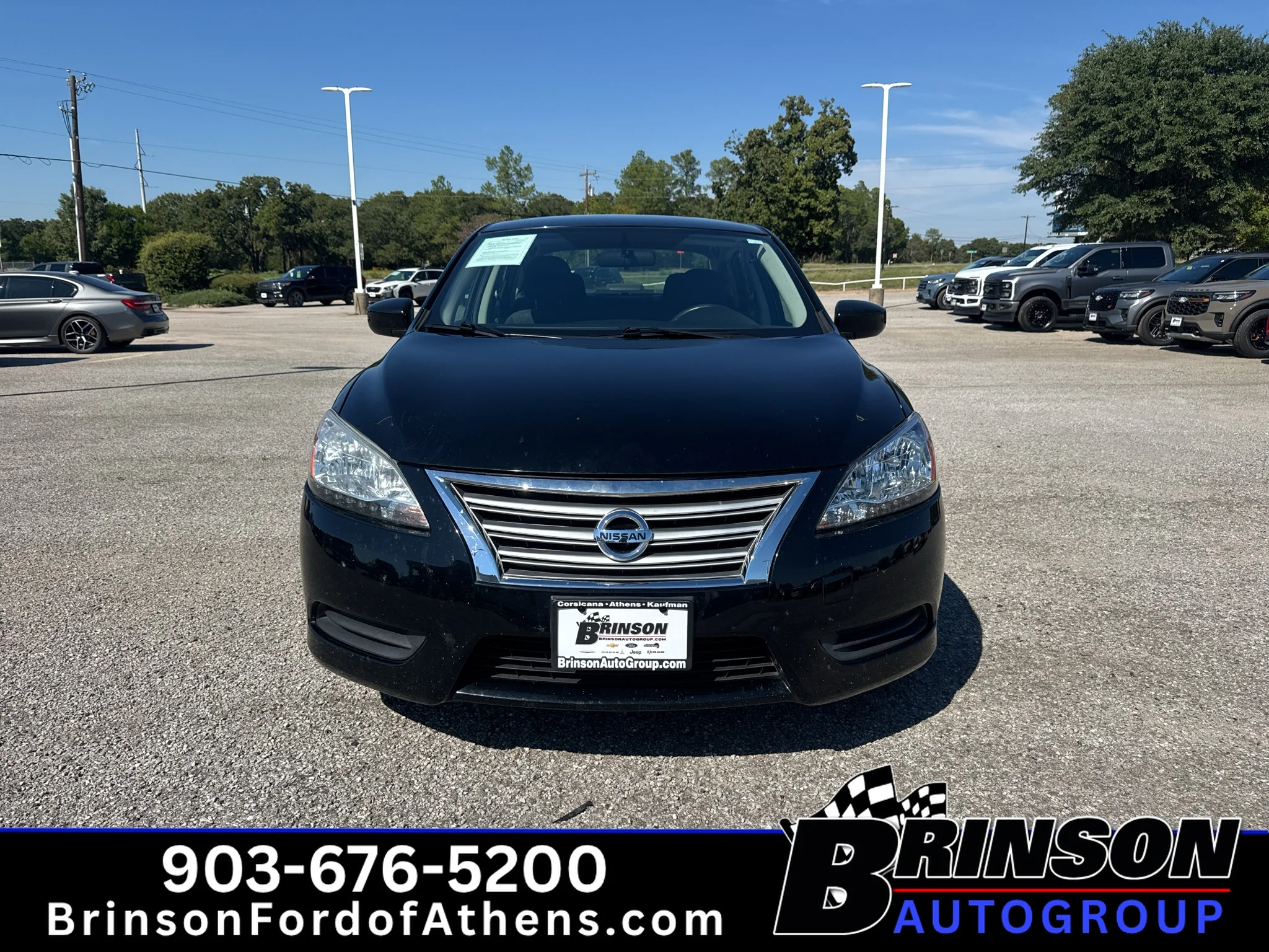 Used 2015 Super Black Nissan SV image 2