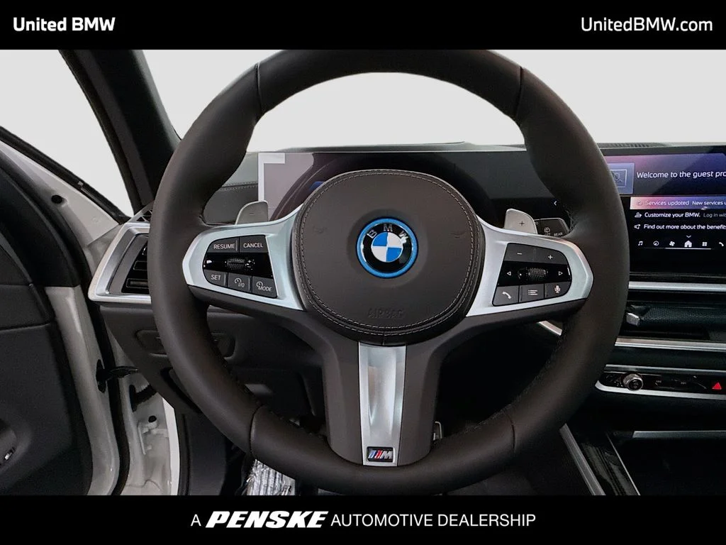 New 2026 Mineral White Metallic BMW xDrive50e image 6