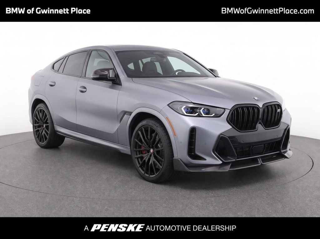 Used 2024 Frozen Pure Grey Metallic BMW M60i image 1