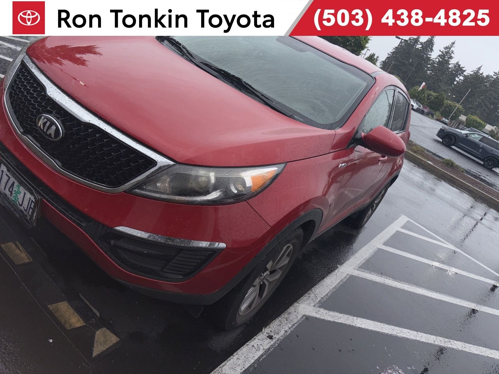 Used 2014 Signal Red Kia LX image 1