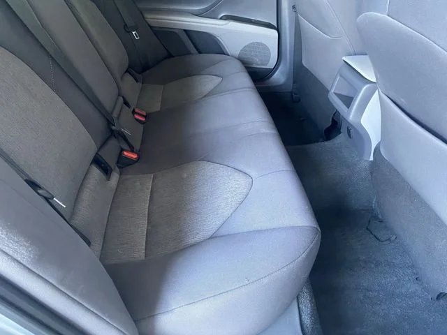 Used 2023 Celestial Silver Metallic Toyota LE image 12