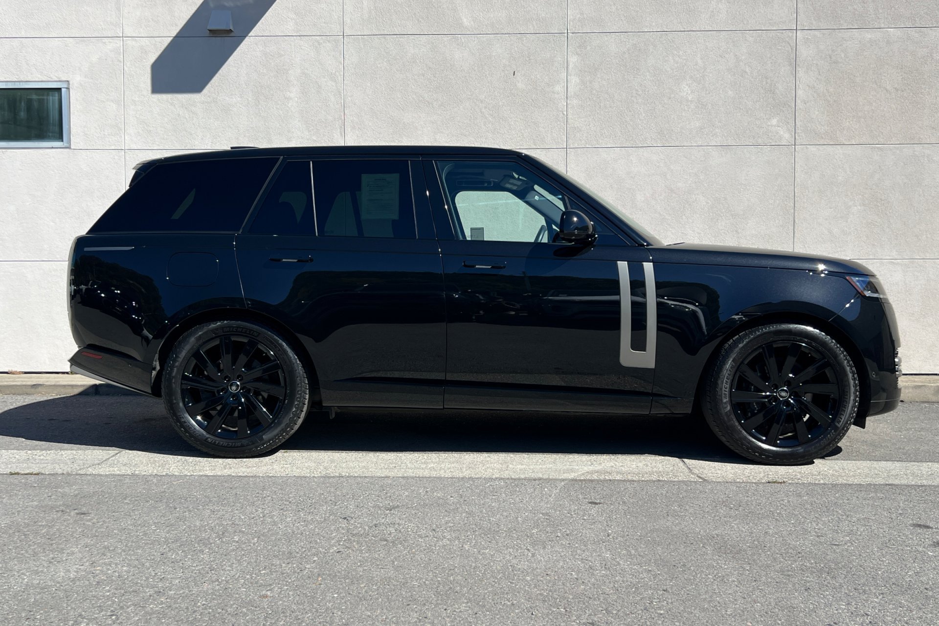 Certified Used 2024 Santorini Black Metallic Land Rover SE image 8
