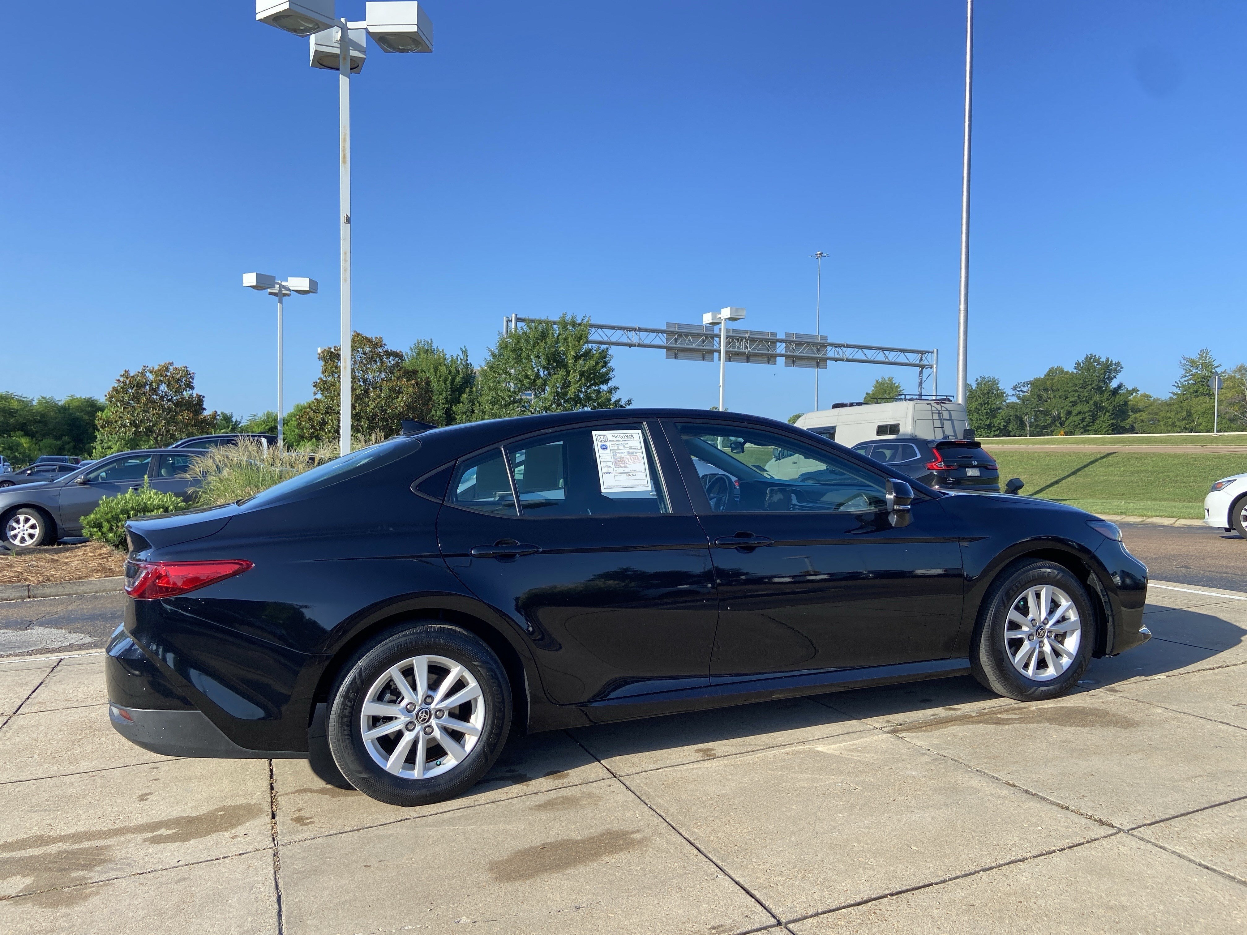 Used 2025 Midnight Black Metallic Toyota LE image 11