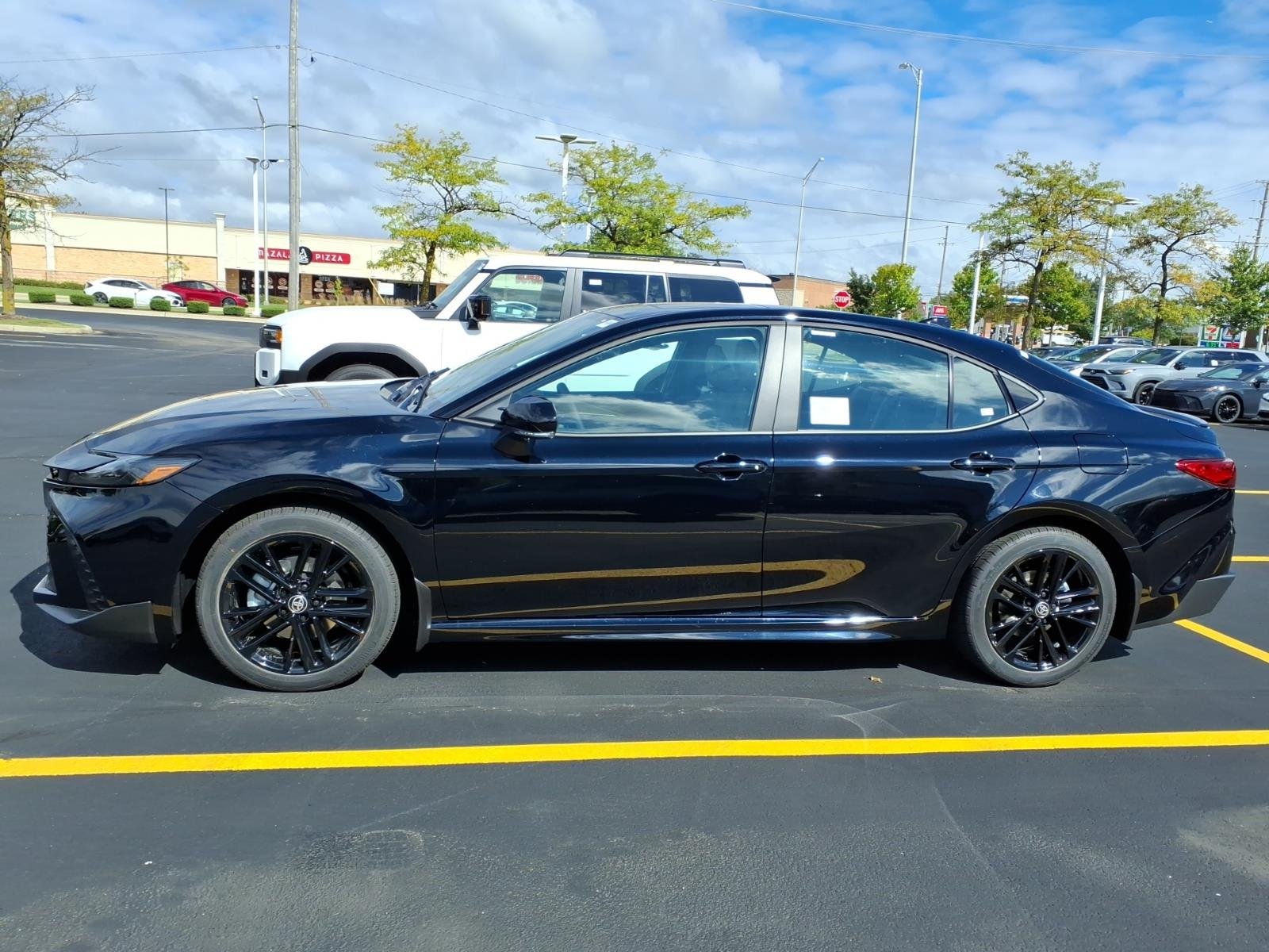 New 2026 Midnight Black Metallic Toyota  SE AWD image 4