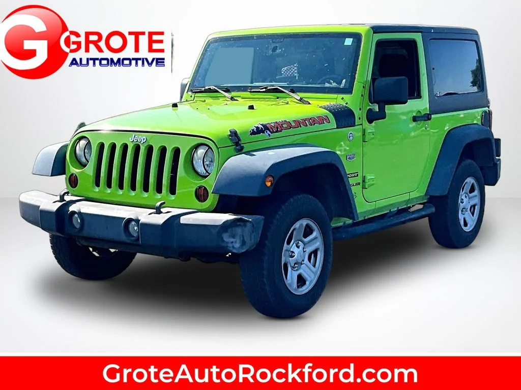 Used 2012 Beige Jeep Sport image 1