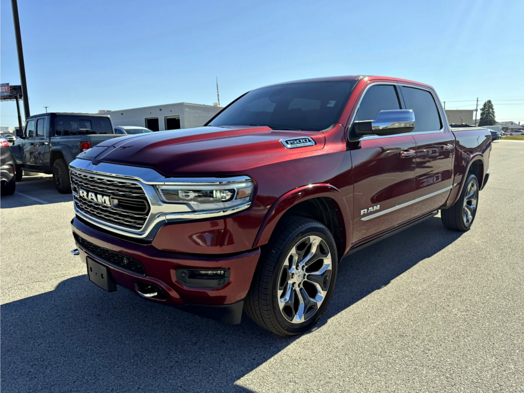 Used 2019 Delmonico Red Pearlcoat Ram Limited image 1