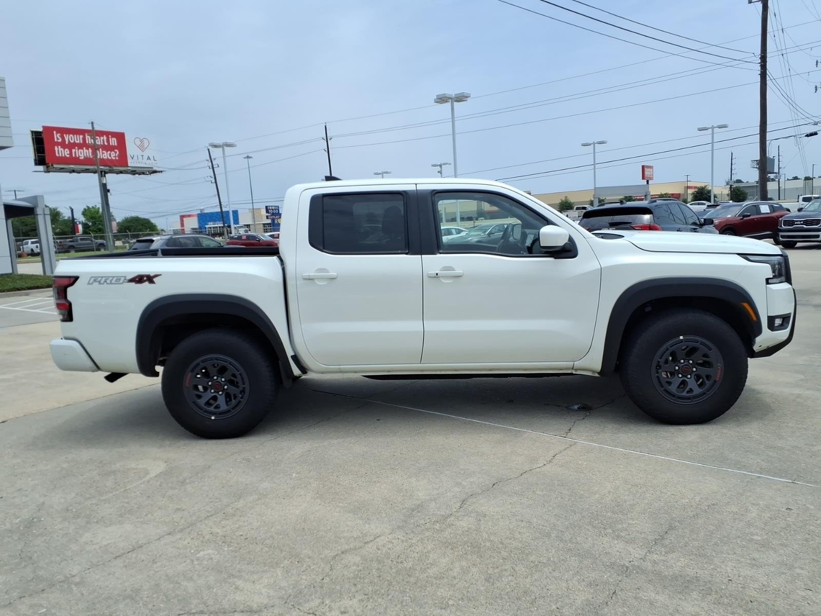 2026 Nissan Frontier PRO-4X White at Robbins Nissan