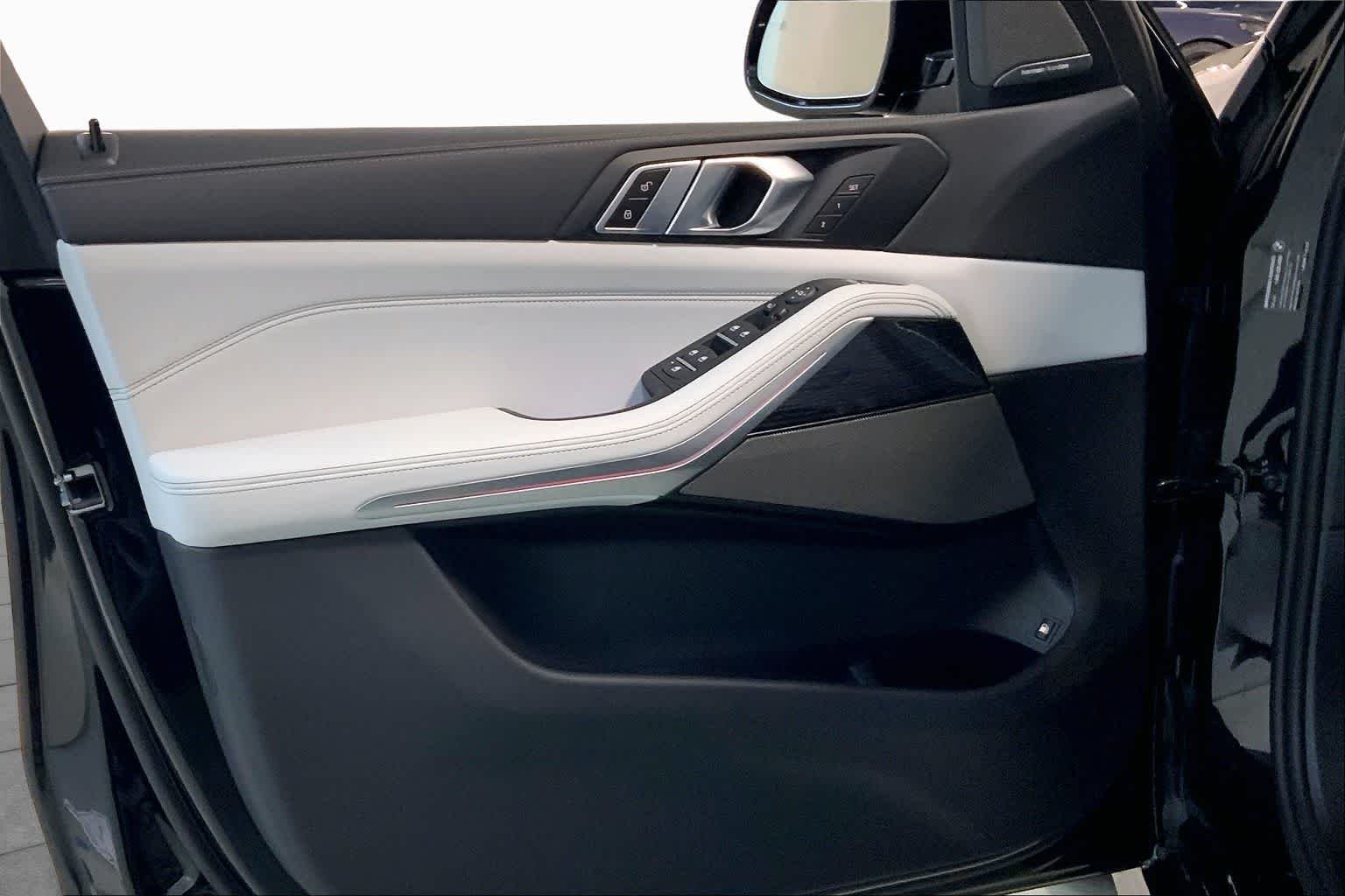 New 2026 Black Sapphire Metallic BMW xDrive50e image 11