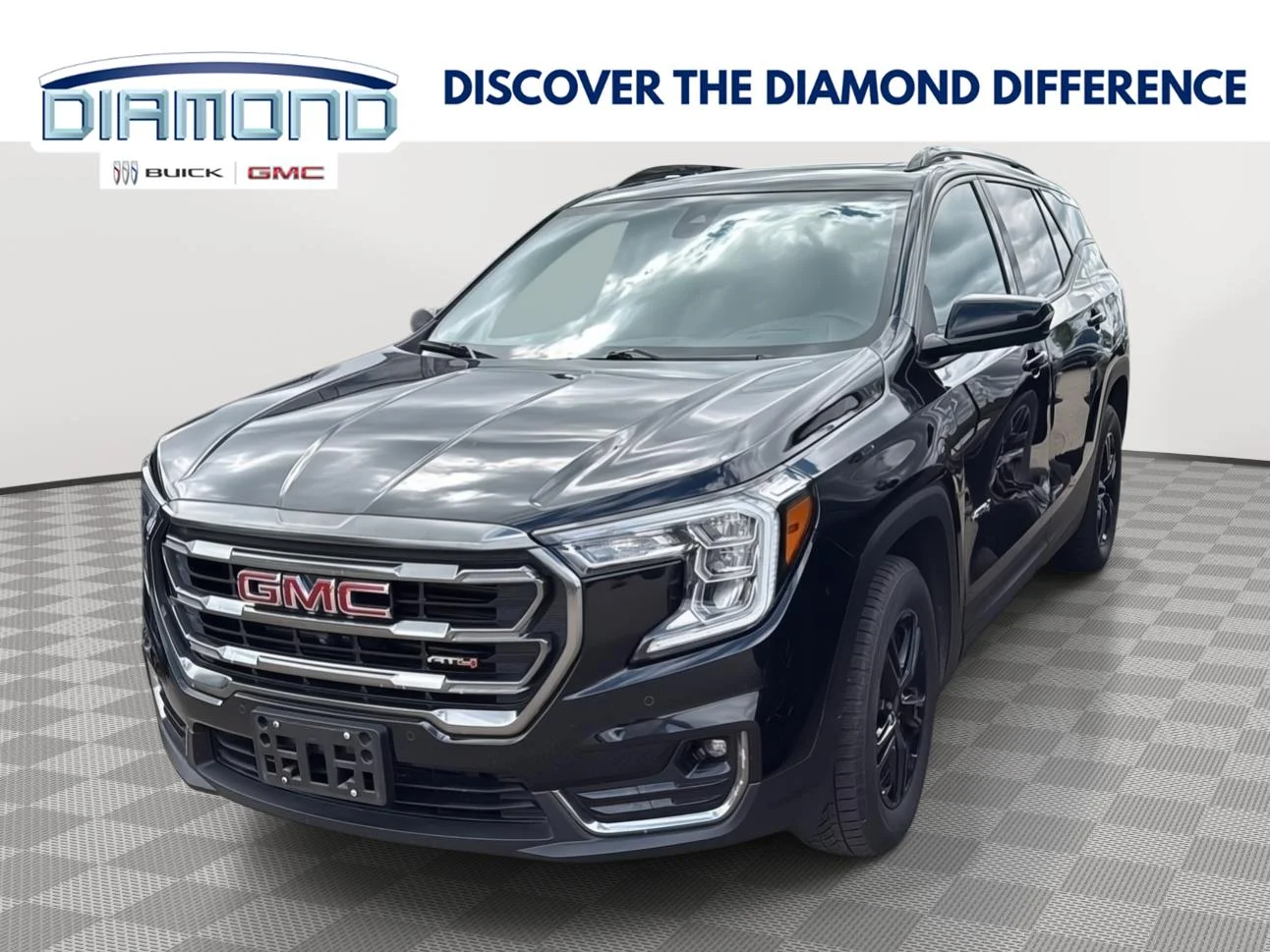 Used 2022 Ebony Twilight Metallic GMC AT4 image 1