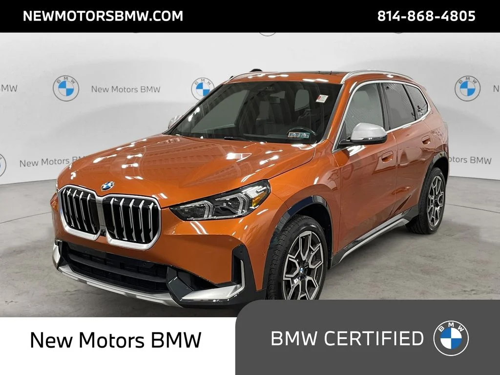 Used 2024 Orange Metallic BMW xDrive28i image 1