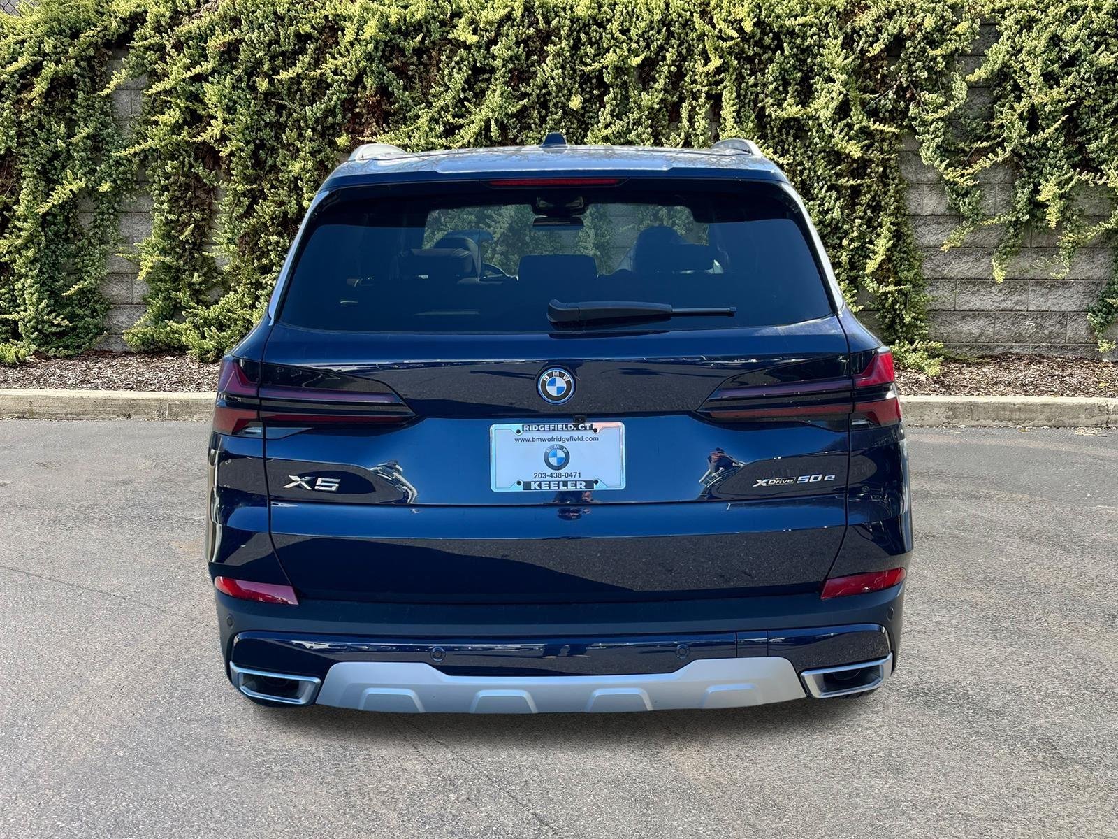 New 2026 Tanzanite Blue II Metallic BMW xDrive50e image 3