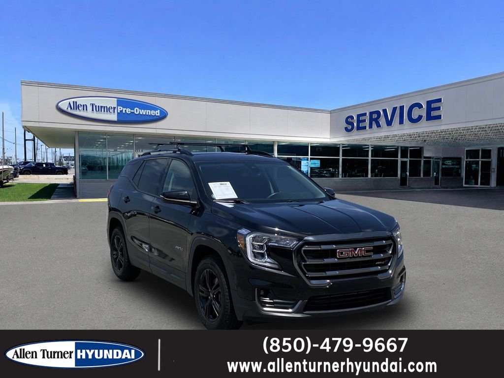 Used 2023 Ebony Twilight Metallic GMC AT4 image 1