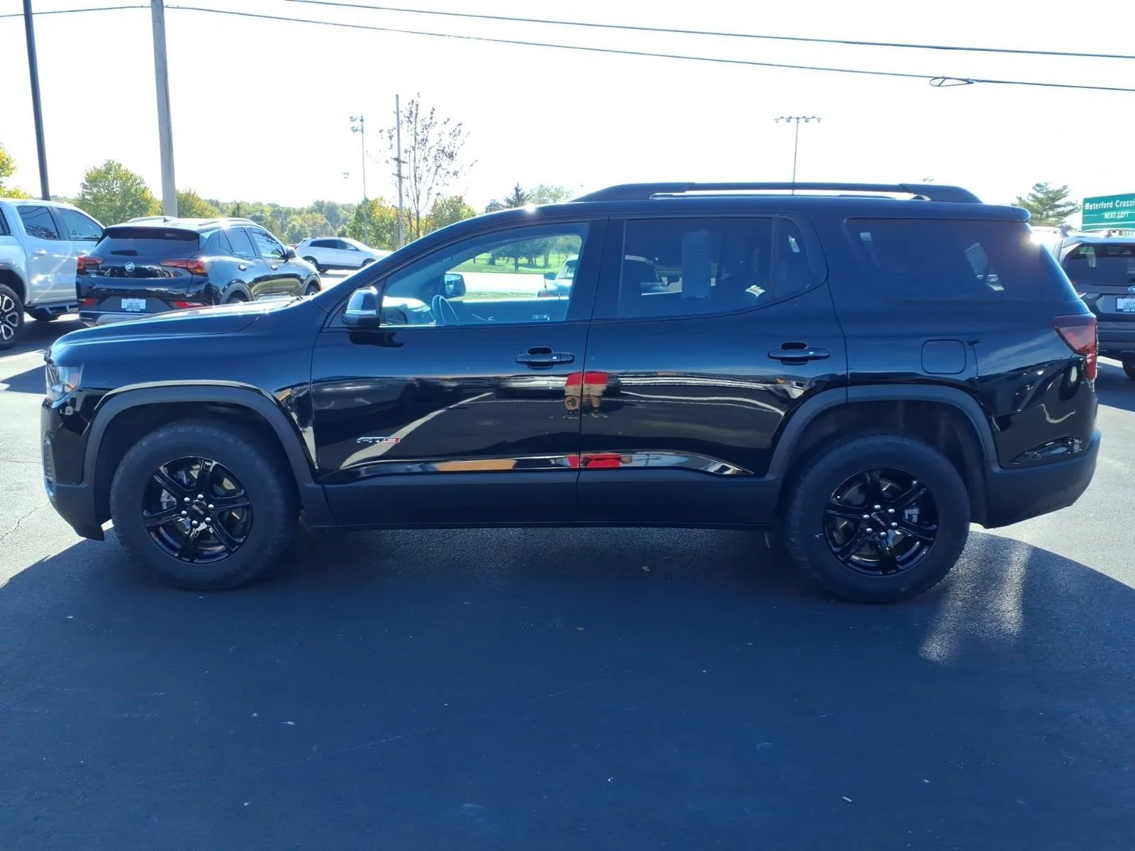 Used 2023 Ebony Twilight Metallic GMC AT4 image 4