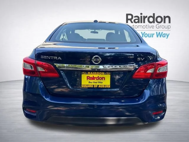 Used 2017 Deep Blue Pearl Nissan SV image 6