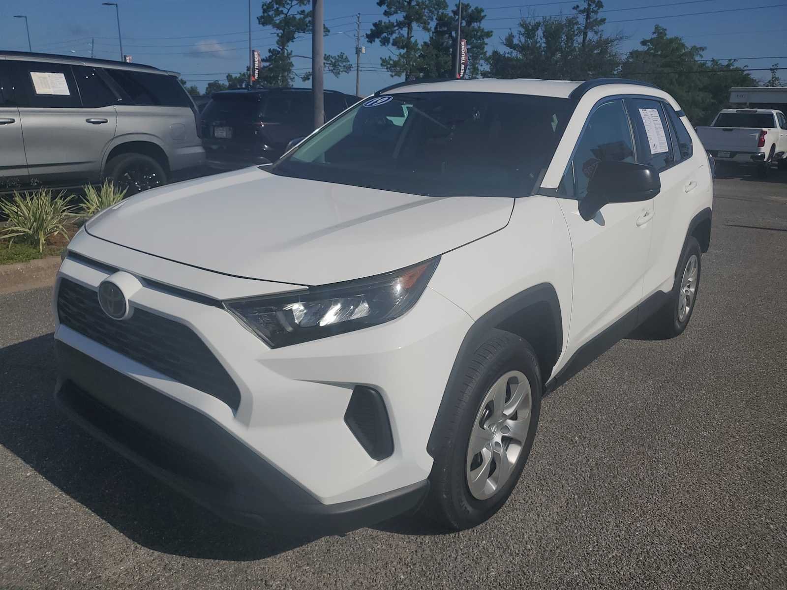 Used 2019 Super White White Toyota LE image 1