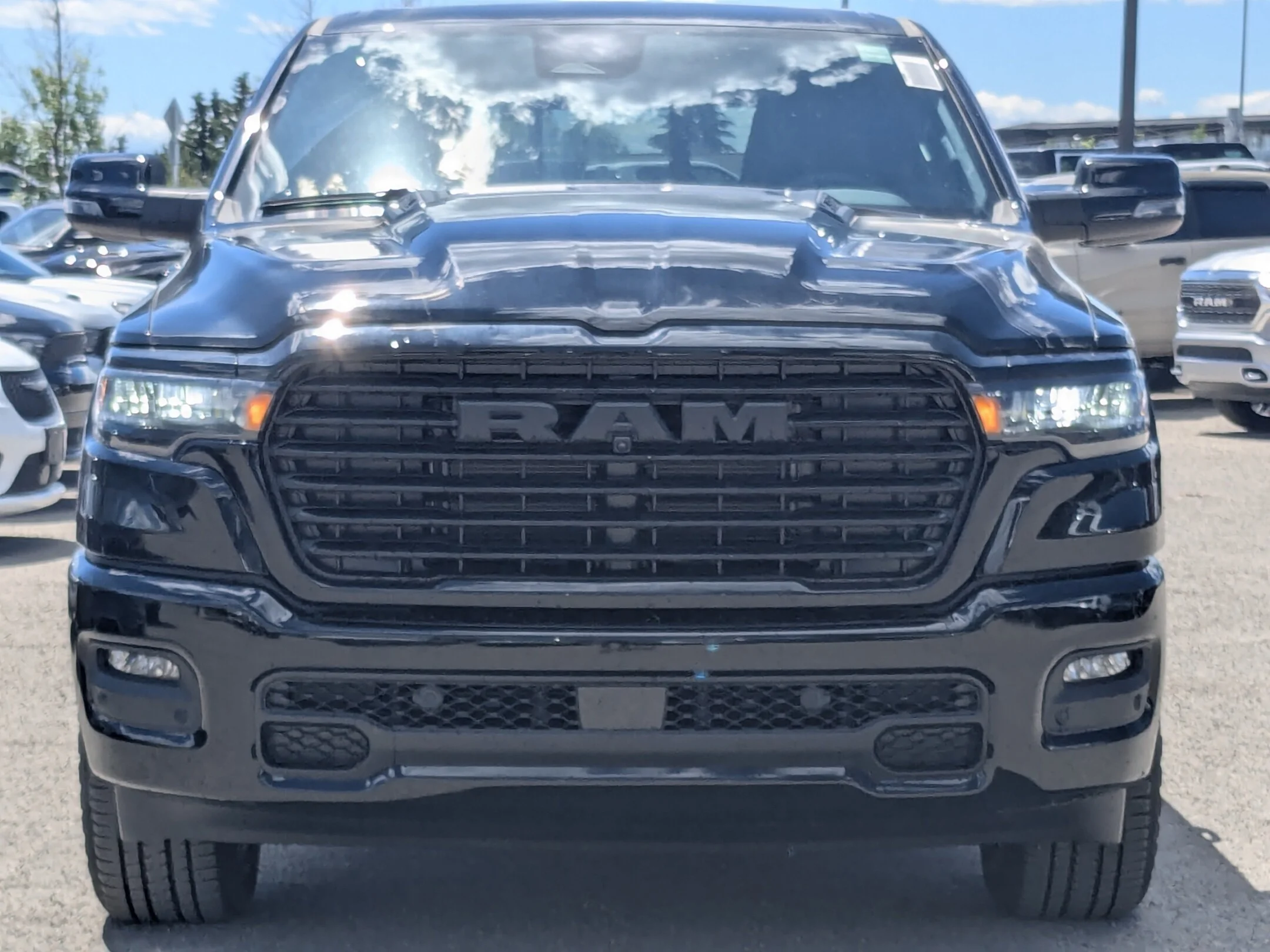 New 2026 Black RAM Sport - - Pano Sunroof - Sport Perf Hood - 3.92 Rear Axle - Trailer Brake Control & More! image 3