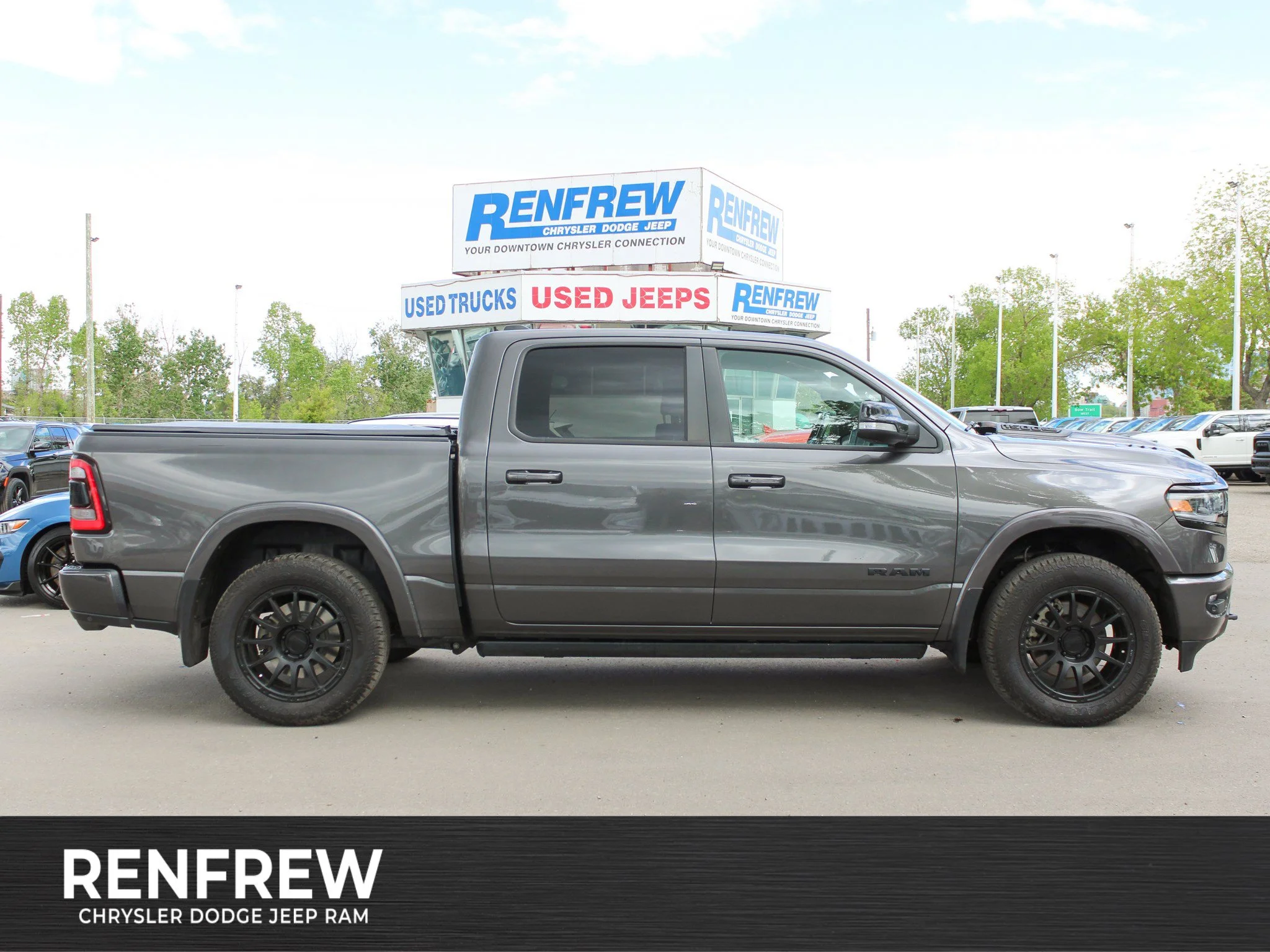 Used 2022 Grey RAM Limited * No Accidents | HEMI V8 | LOADED | ENVY Wheels | Head-Up Display | Night Edition image 1