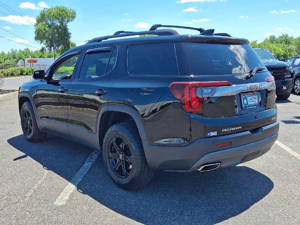 Used 2021 EBONY TWILIGHT METALLIC GMC AT4 image 8