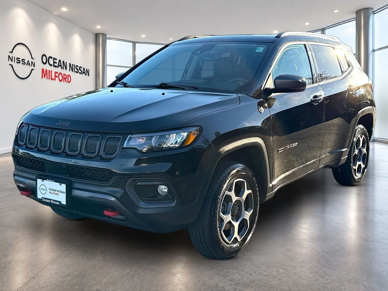 Used 2022 Diamond Black Jeep Trailhawk image 1