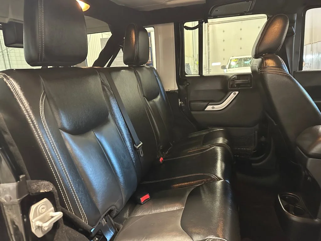 Used 2016 Black Jeep Unlimited Sahara image 28