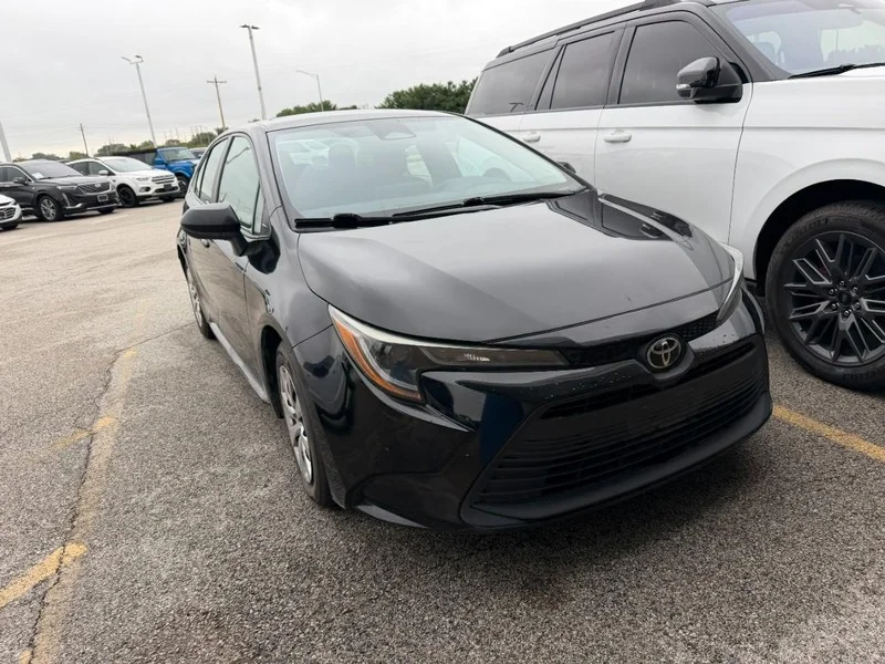 Certified Used 2024 Midnight Black Metallic Toyota LE CVT (Natl) image 2